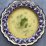 potato leek soup served in a bowl