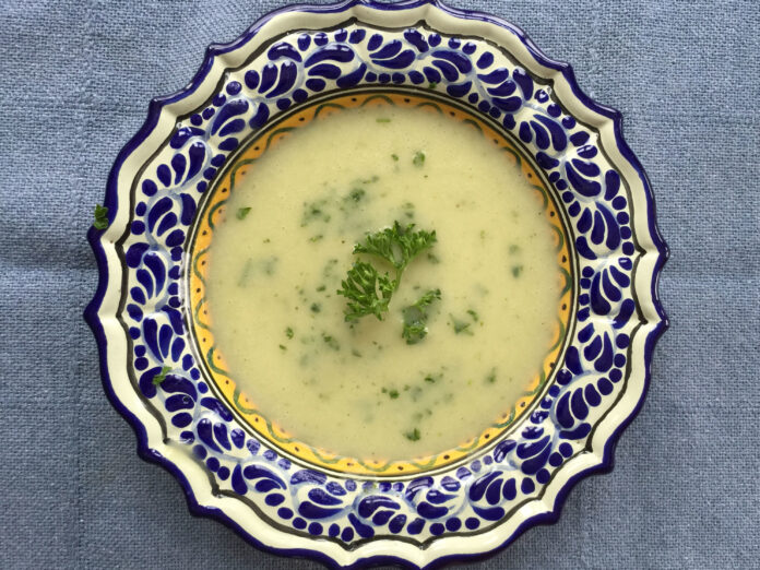 potato leek soup served in a bowl