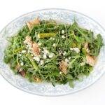 Asparagus Panzanella with Lemon Dressing served on a plate.