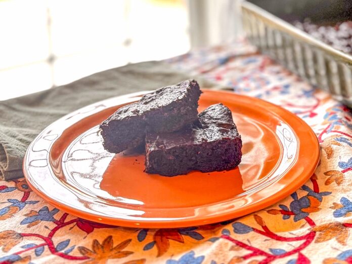 two brownies stacked on a plate