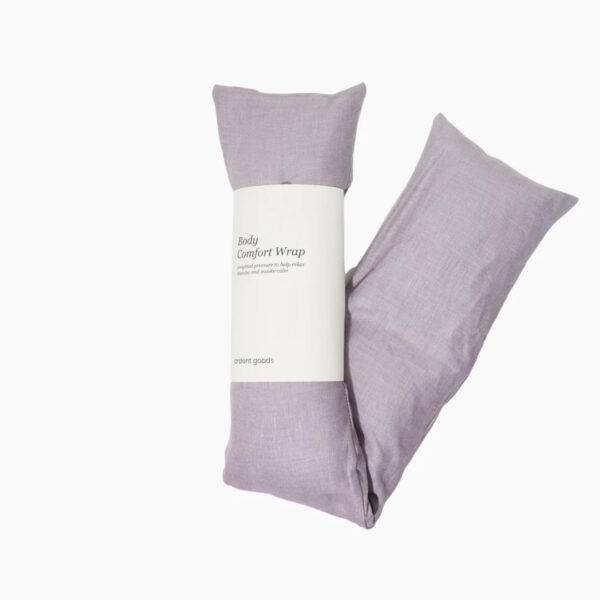 A weighted body wrap from Ardent Goods made in lavender-covered linen.