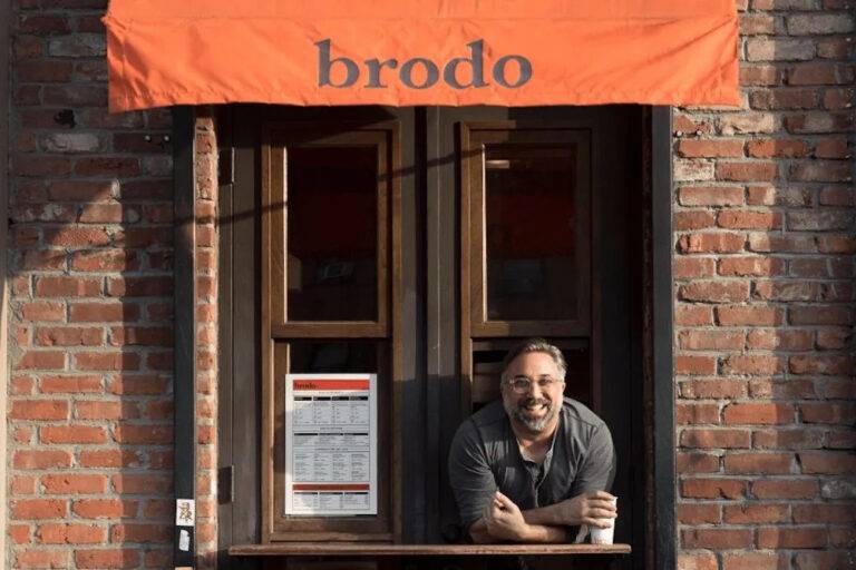 Brodo broth's founder, Marco Canora, serving Brodo broth from his restaurant's takeout window. Photo credit - Brodo