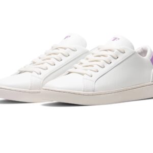 Simple white tennis shoes from vegan brand Thousand Fell that look like white leather. The shoes have a bright lavender accent on the back heel.