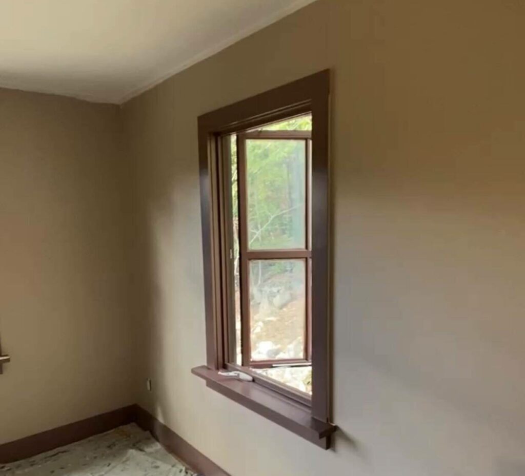 Side window painted with "hot chocolate" trim and "band aid" walls.
