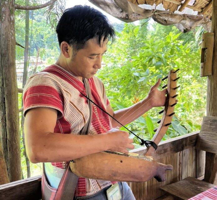 Karen Hill tribe member singing a local love song at lunch.