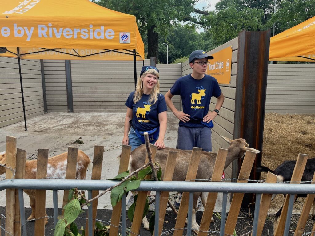 Volunteer goat-herders Heather and Axel Stahl with the goats. 