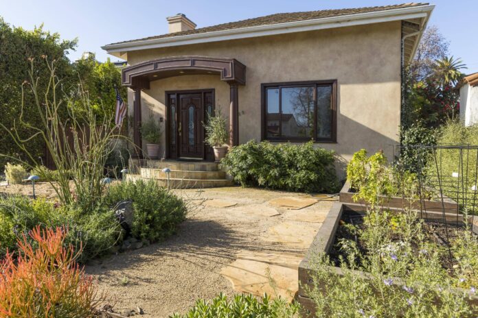 Drought tolerant garden in front yard of house in Los Angeles.