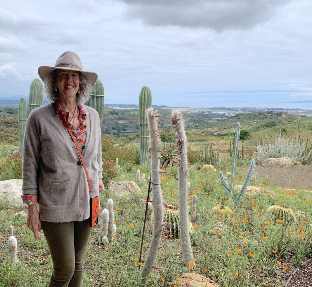 Stacy Pulice with cacti.