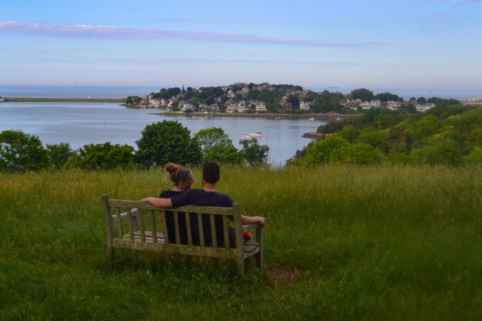 A couple on a bench in World's End Reservation.