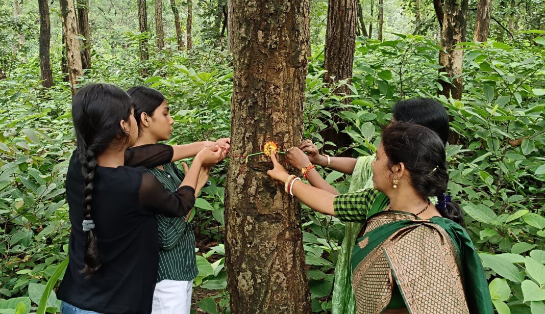students with tree in calcutta forest
