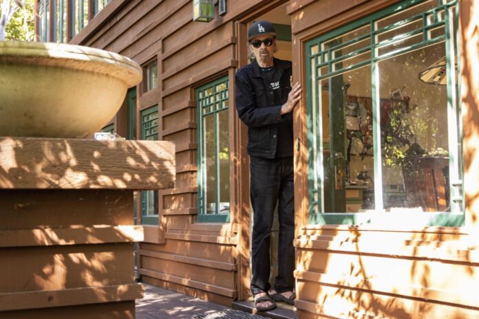 TC Boyle in the doorway of his home