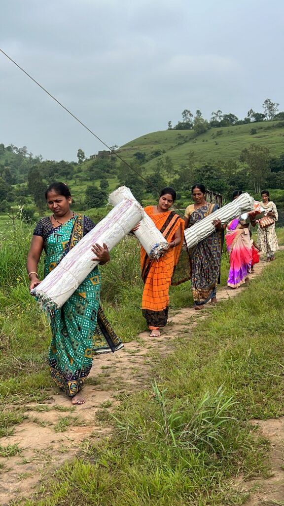 women carrying plastic material