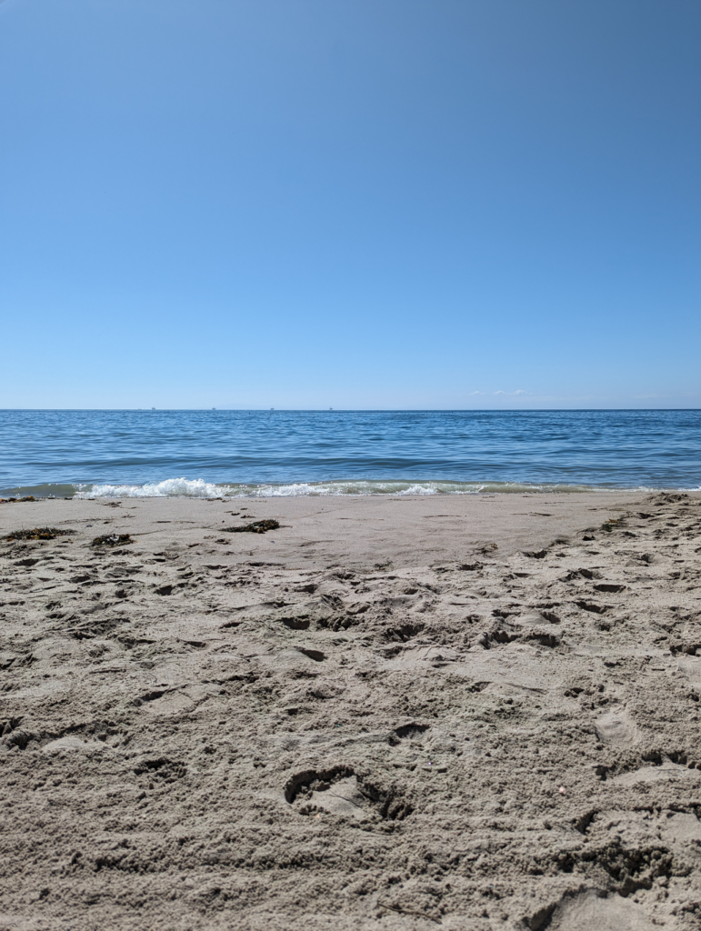 Beach sand and water