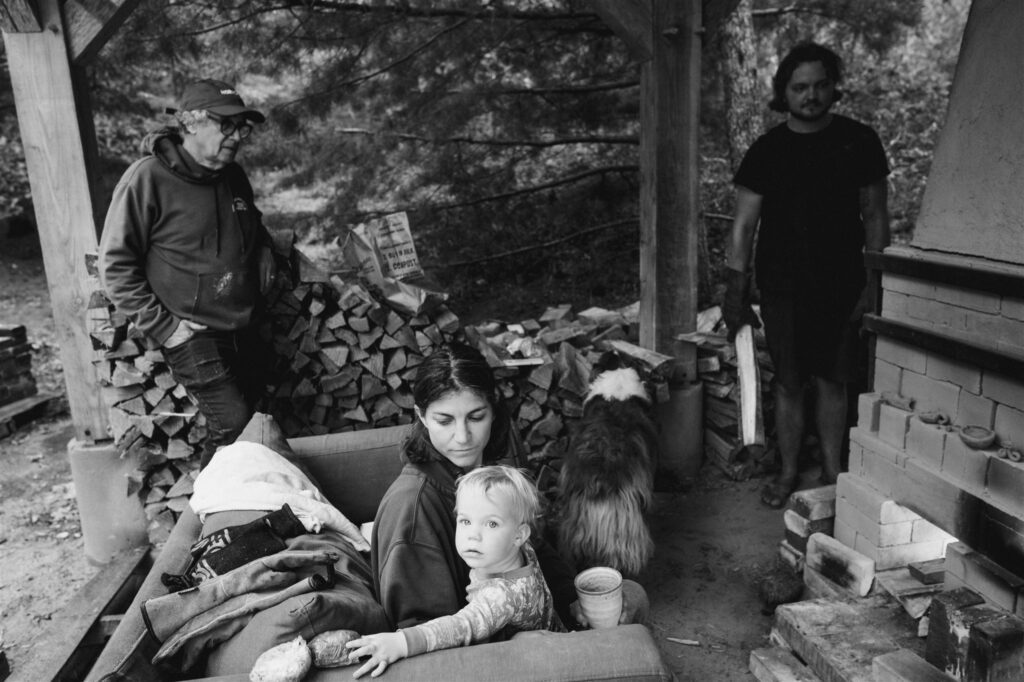 family sitting outside