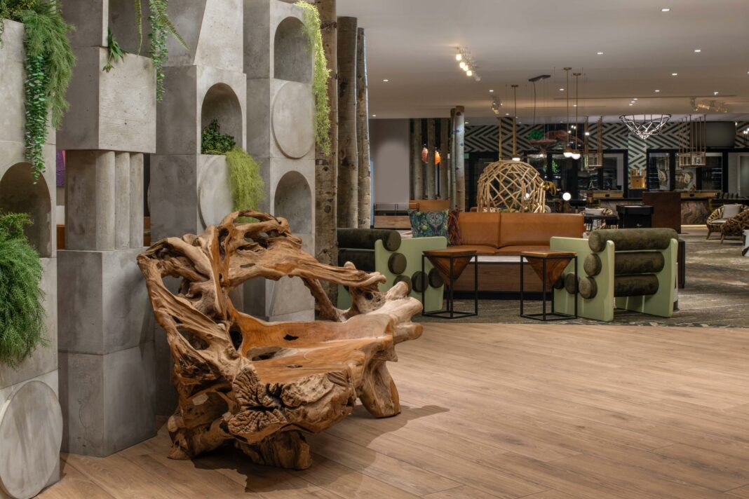 lobby of hotel with wooden bench