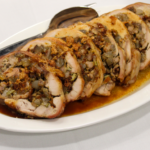 Rabbit in Porchetta plated and served.