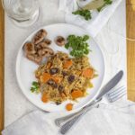 prepared choucroute on a table with settings and garnish