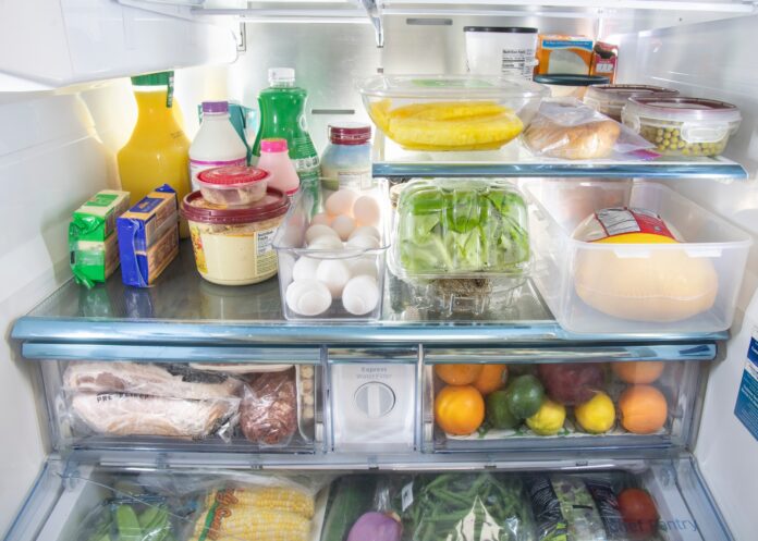 inside of a well organized refrigerator with proper food storage