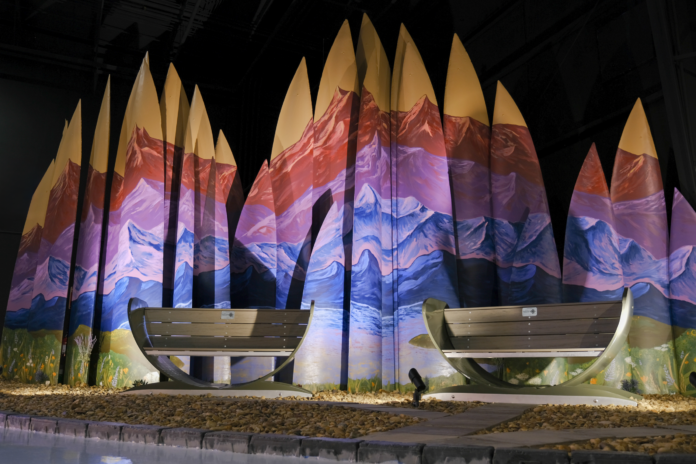 A mountain mural painted on wind turbine blades.