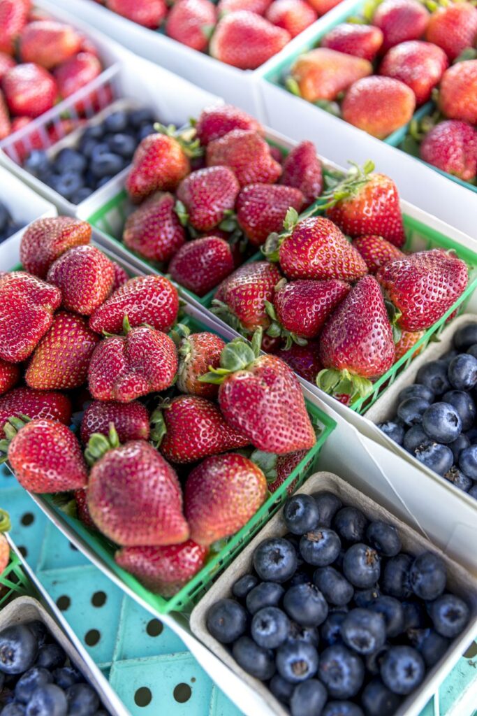 baskets of strawberries and blueberries