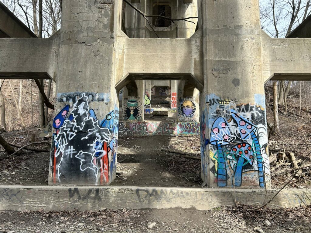 graffiti under concrete underpass