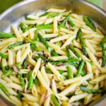 Penne with Asparagus and Shiitake in a bowl.