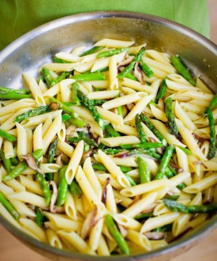 Penne with Asparagus and Shiitake in a bowl.