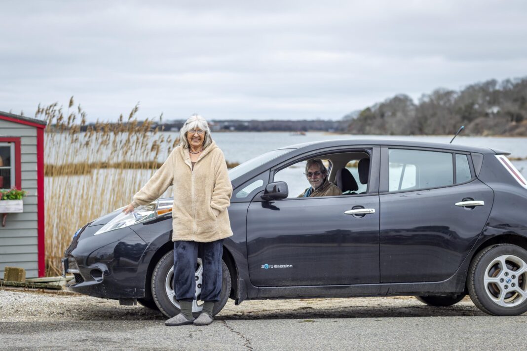person standing in front of car