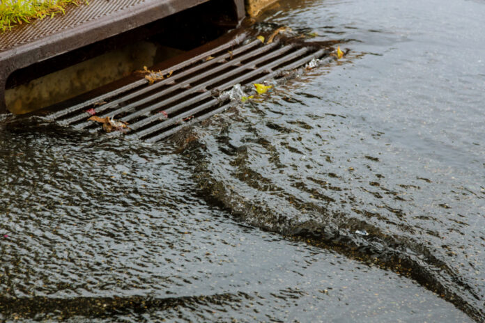 water flowing into storm drain