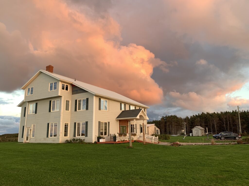 inn at dusk with pink clouds