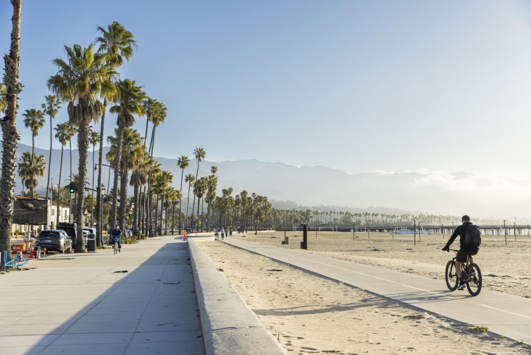 A cyclist on the beach bike path in Santa Barbara.