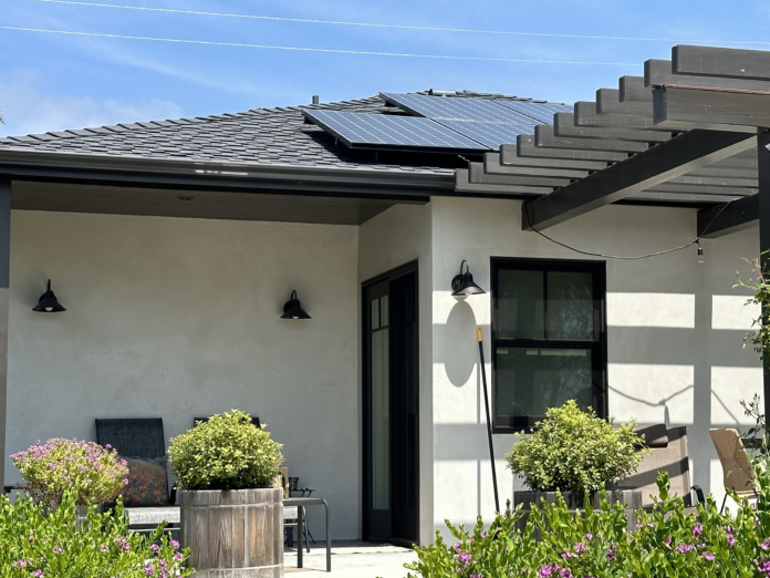 a home with rooftop solar panels