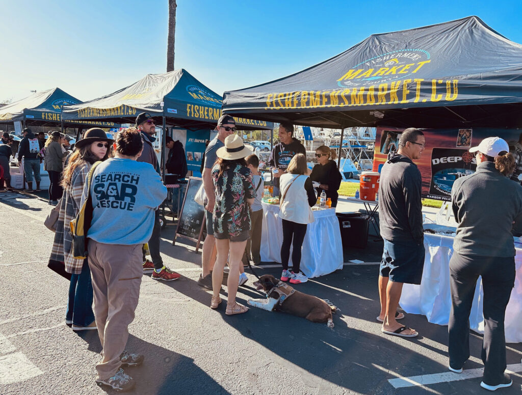 shoppers at the outdoor Oceanside fishermen's market
