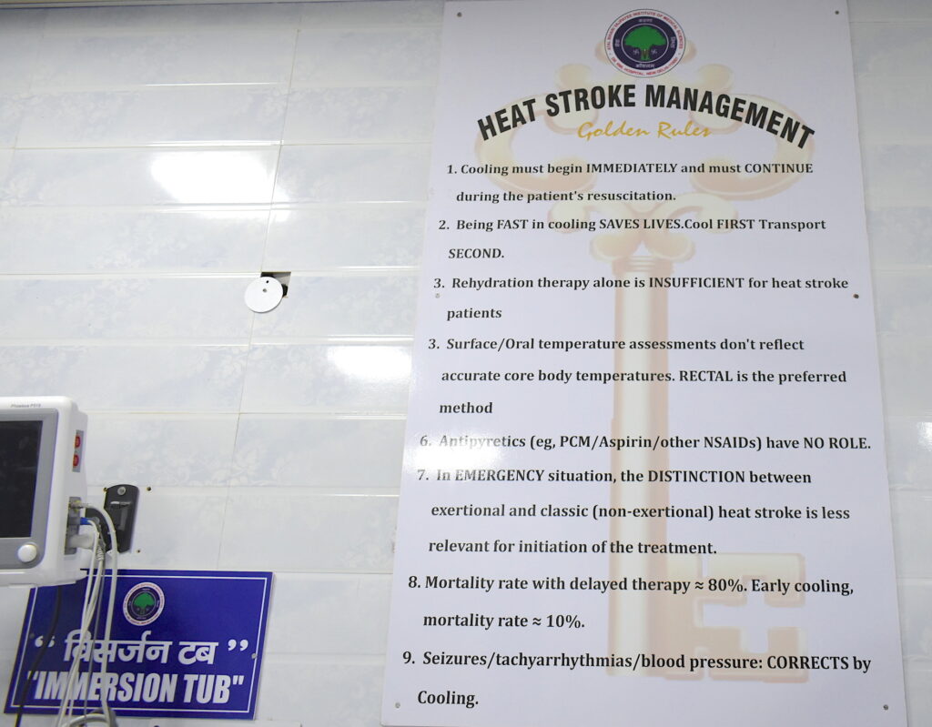 sign in hospital with golden rules of heat stroke