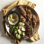 marinated chicken thigh kebabs plated.