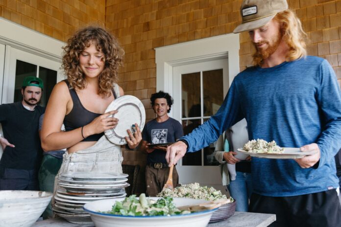 people putting healthy food on their plate