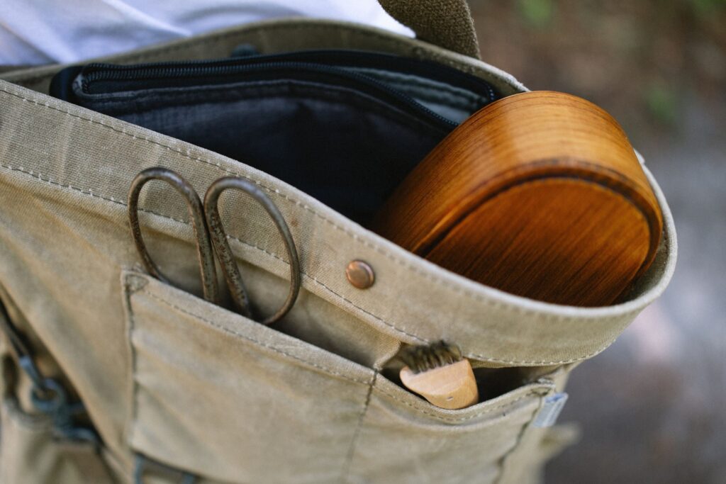 bag with scissors and wood box