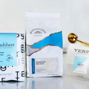 Three bags of coffee from the brands Broadsheet, Wonderstate, and Verve.