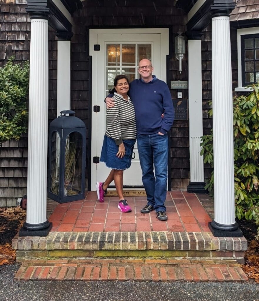 two people standing in doorway