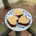 three pieces of cake cut into the shape of hearts
