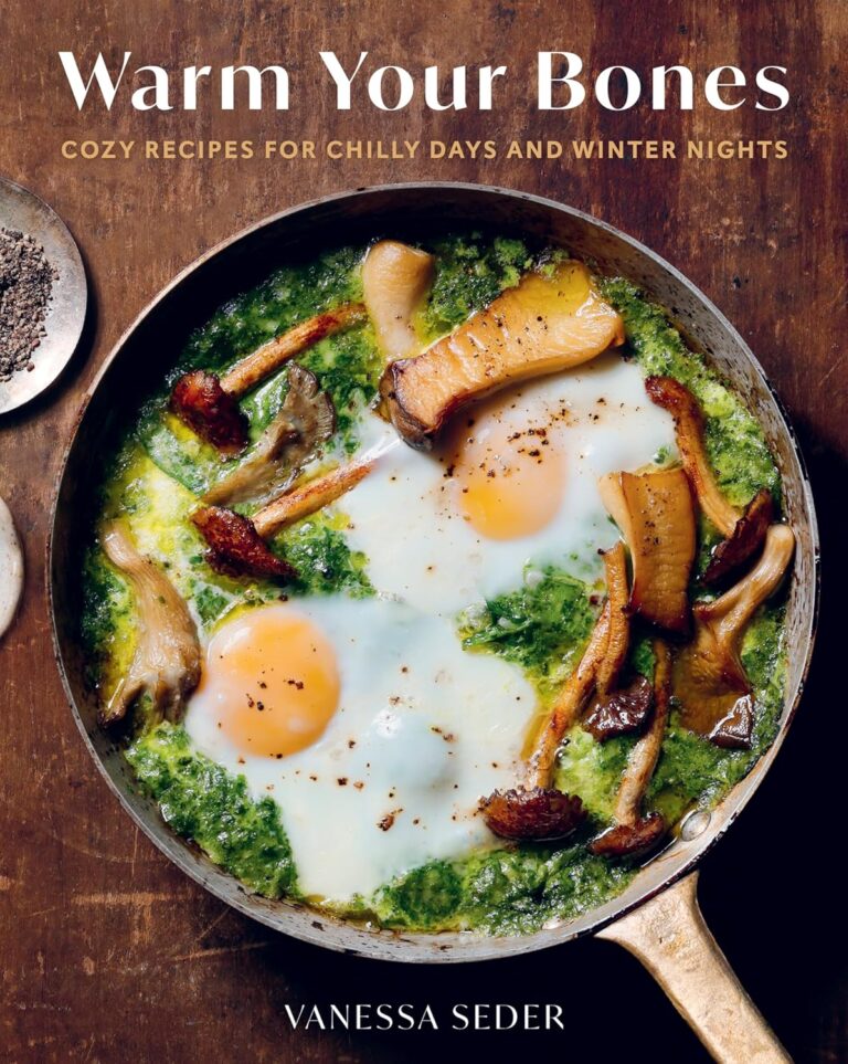 A cookbook cover showing a pan full of greens, eggs, and mushrooms, and the words โWarm Your Bones: Cozy Recipes for Chilly Days and Winter Nightsโ by Vanessa Seder.