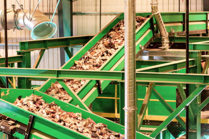 factory machinery sorting food waste and trash