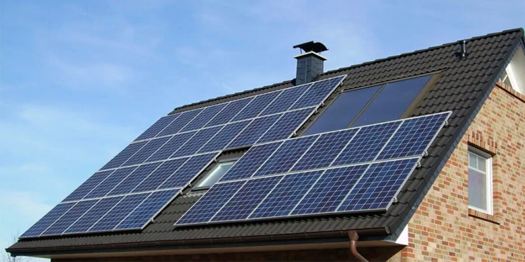 a house with solar panels on the roof