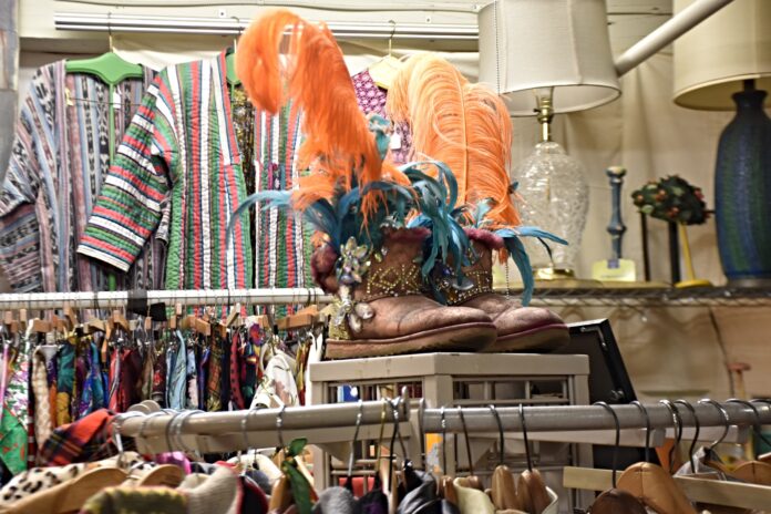 bedazzled boots with feathers decoration