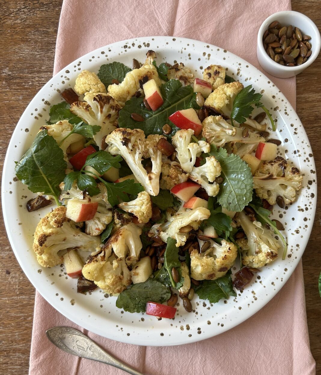 Roasted Cauliflower Salad with Kale, Dates, and Pepitas, in a Lemon Vinaigrette