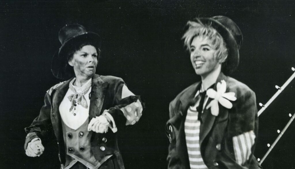Judy Garland and Liza Minelli dressed as hobos. 
