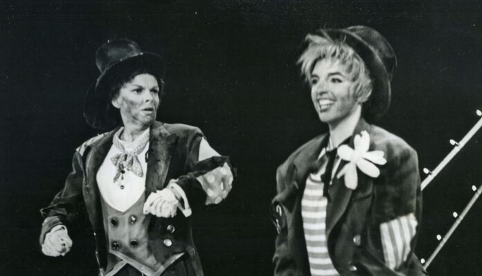 Judy Garland and Liza Minelli dressed as hobos.
