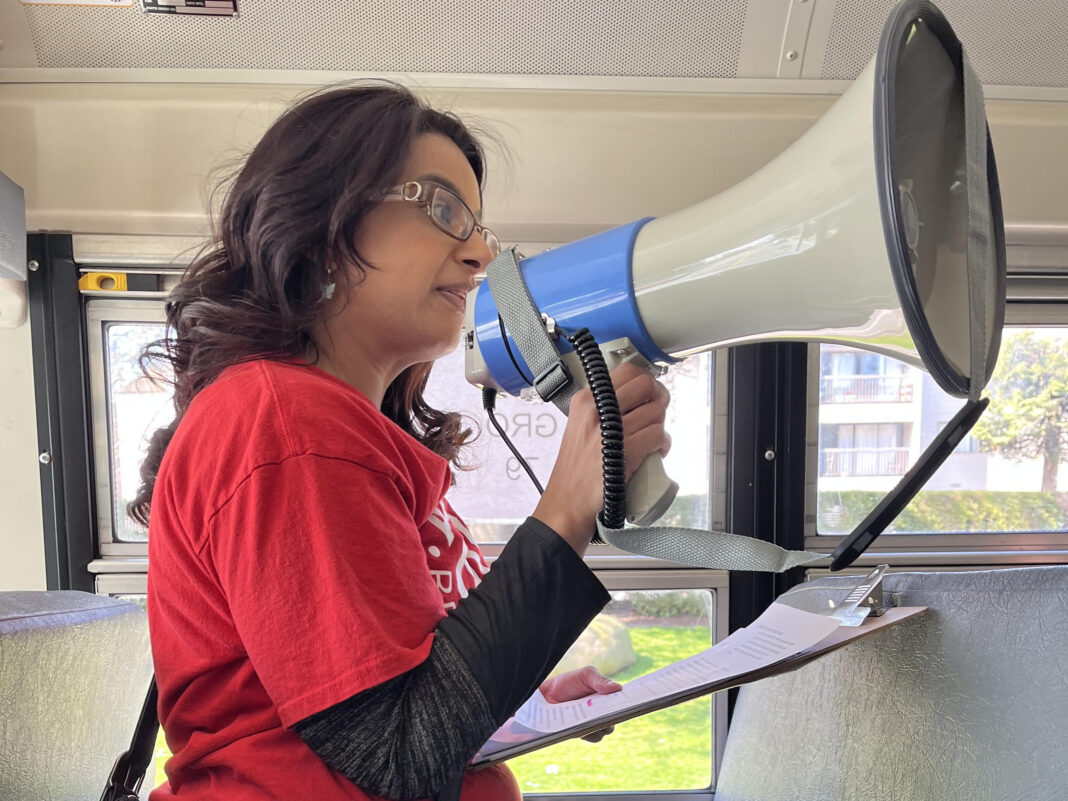 a woman campaigning with a megaphone