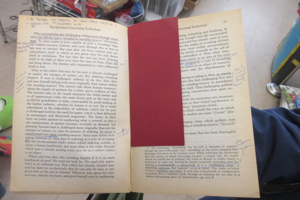 a book from salvation army with annotations in the margins