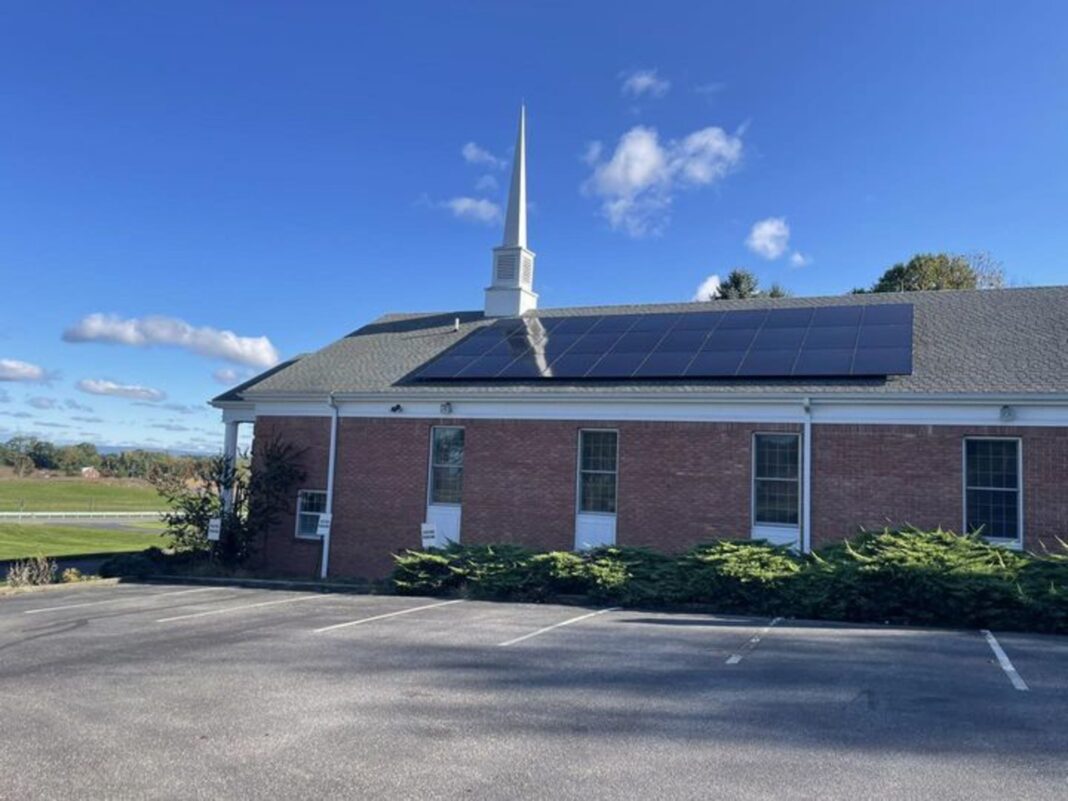 a church in Pennsylvania with solar panels on the roof